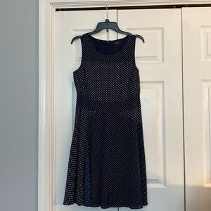 Navy polkadot dress.
